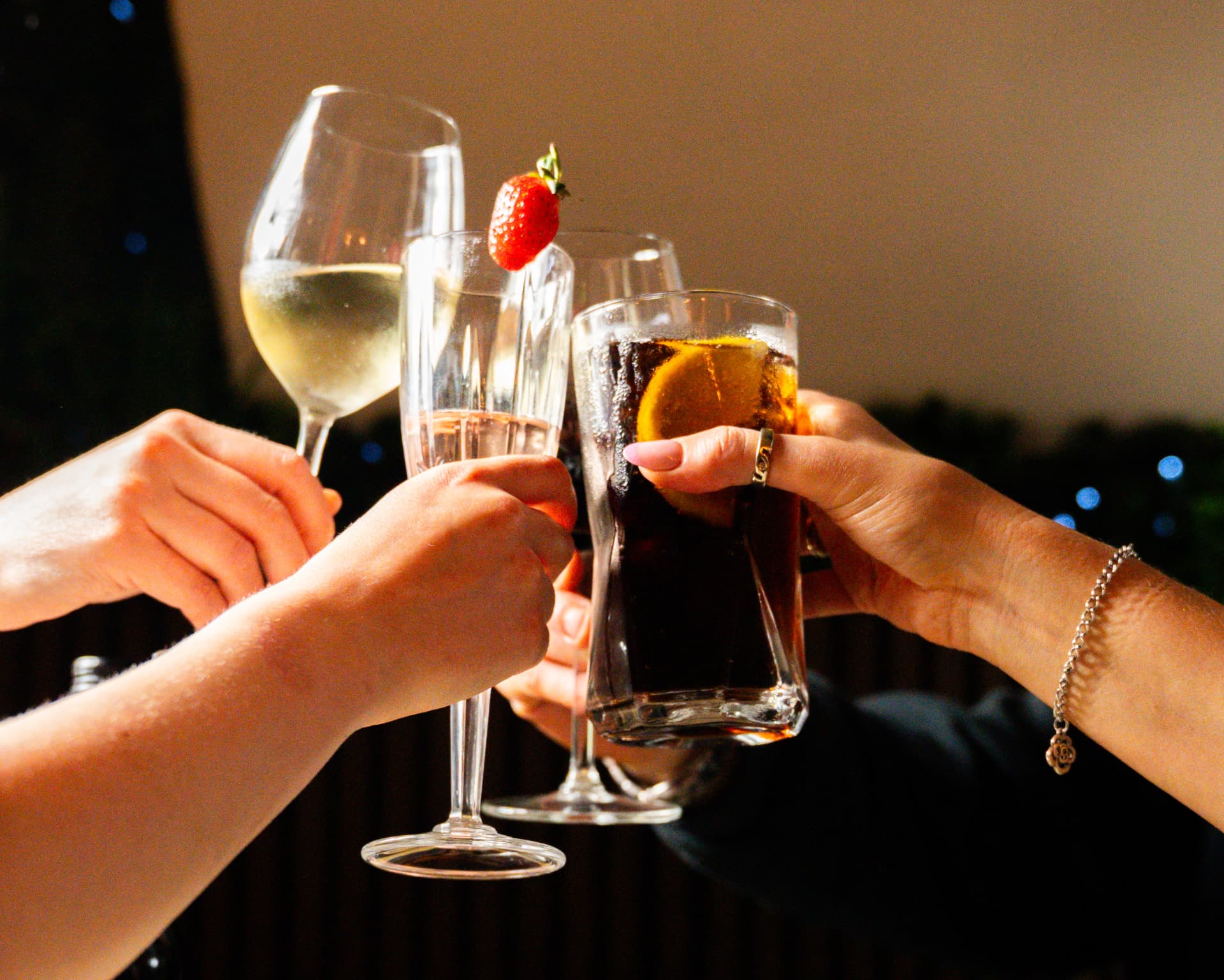 Drinks being raised in a toast at La Luna