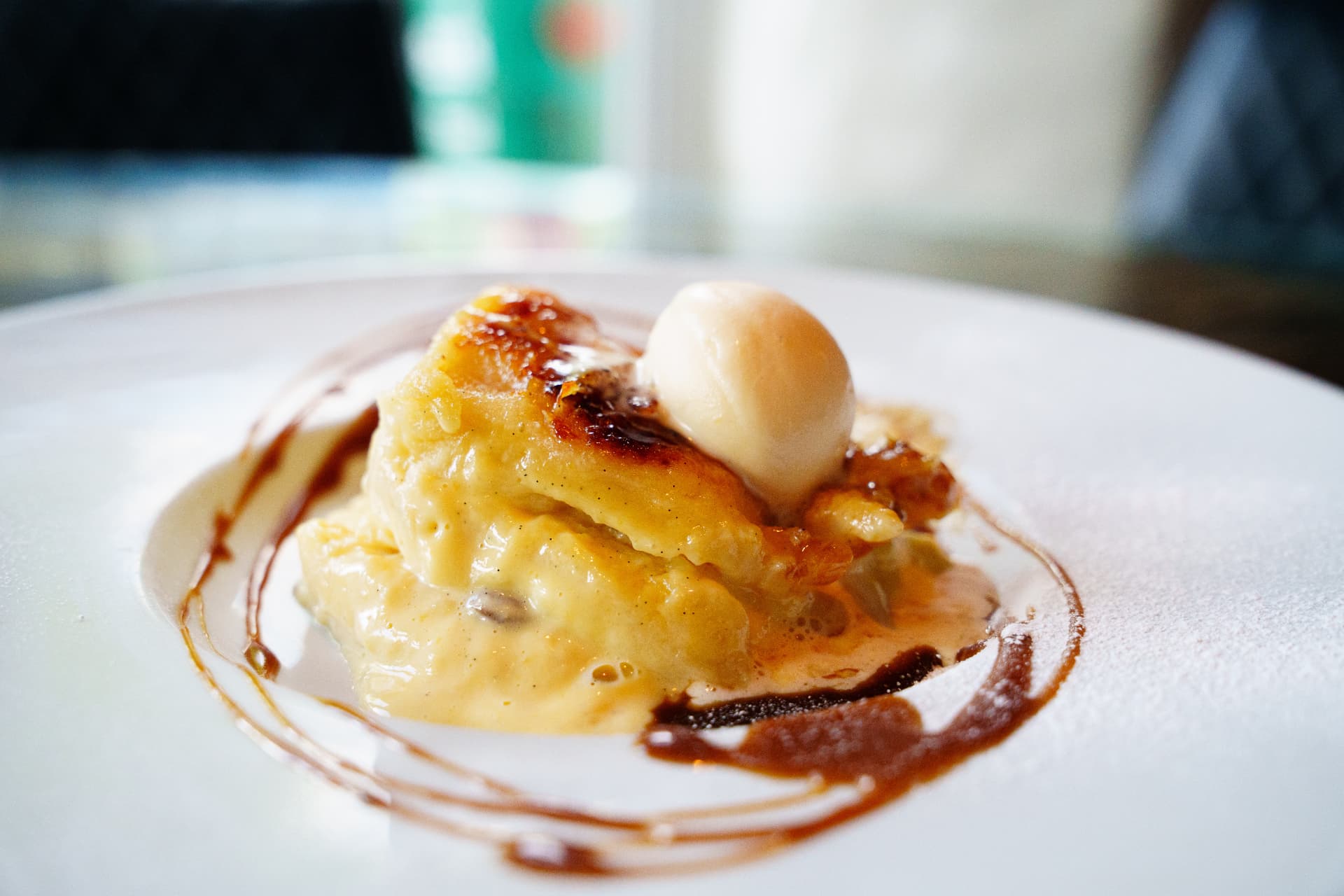 Bread and butter pudding with vanilla ice cream and toffee sauce at La Luna