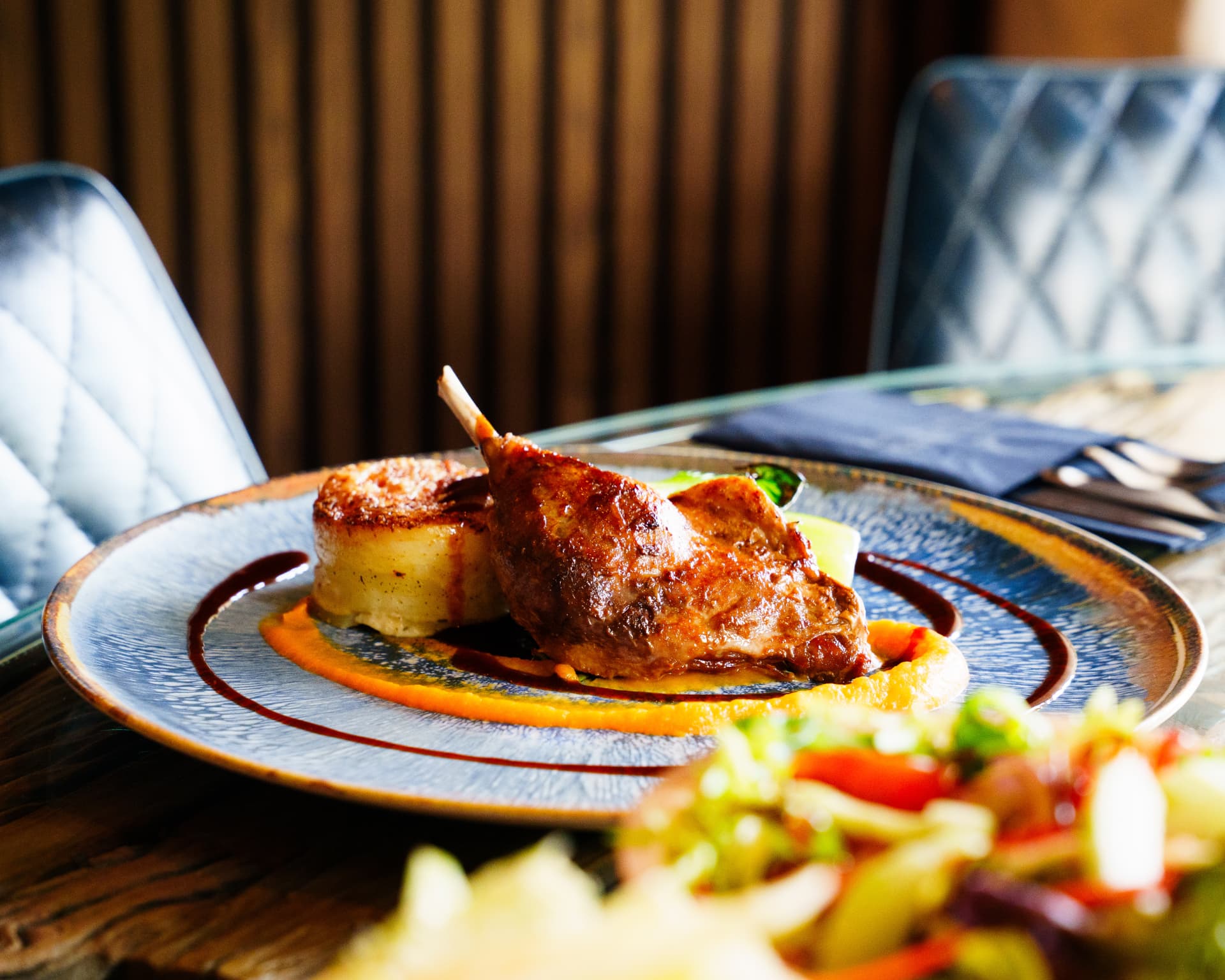 Confit duck leg with fondant potato and red wine reduction