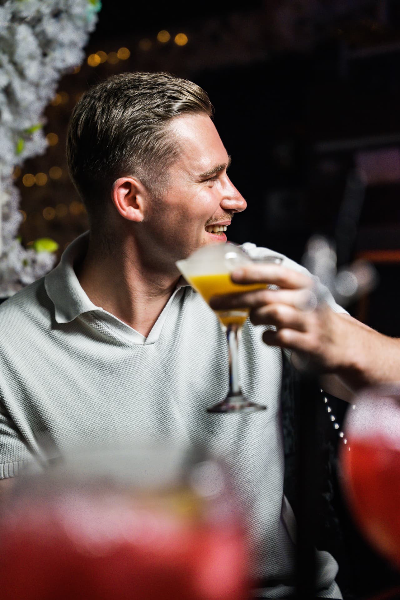 Guest enjoying a cocktail in the Luna Lounge